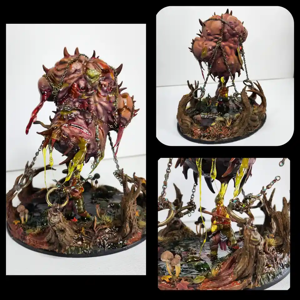 A composite image displays a highly detailed, grotesque miniature of a monstrous, multi-eyed, fleshy creature with chains…