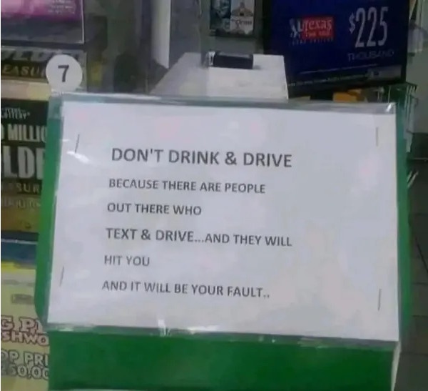 A white sign in a store displays a warning message about not drinking and driving, adding that text-and-drive drivers will…