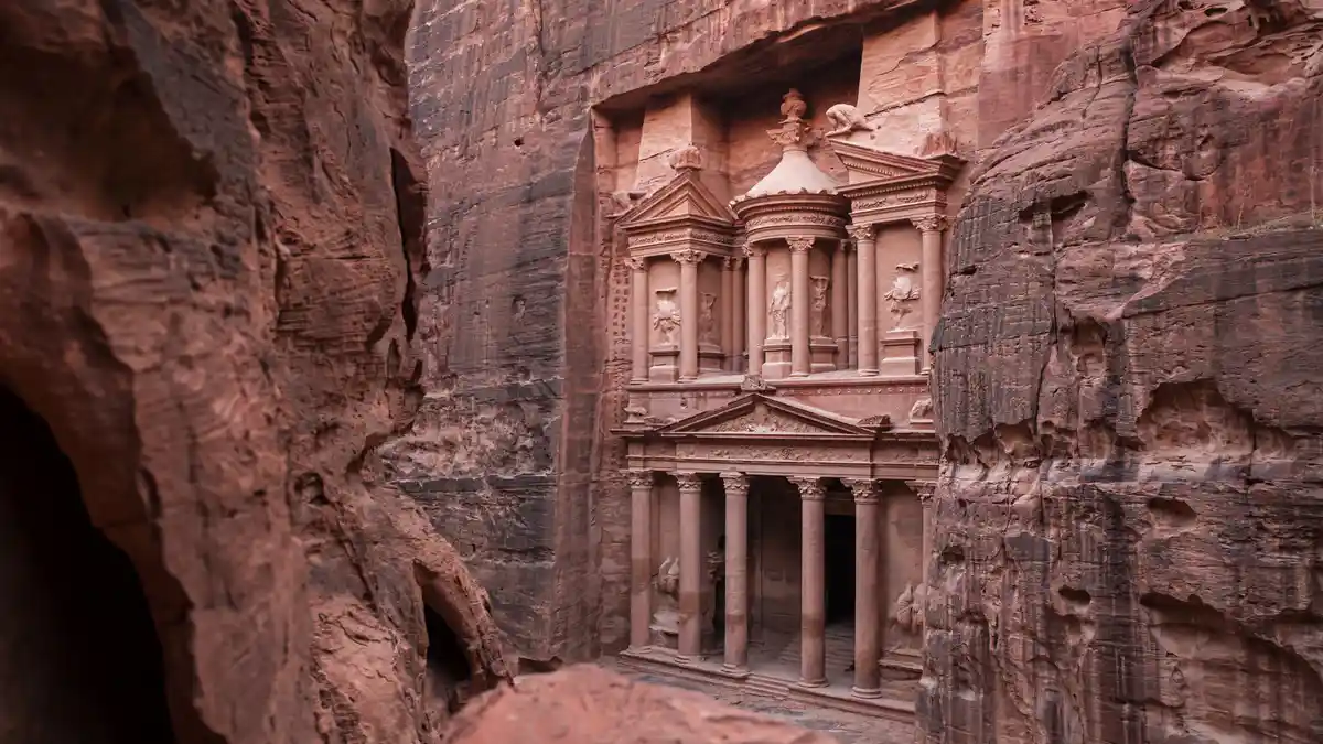 Petra, an ancient city carved into Jordan's sandstone cliffsides in the 1st century, draws nearly a million tourists…