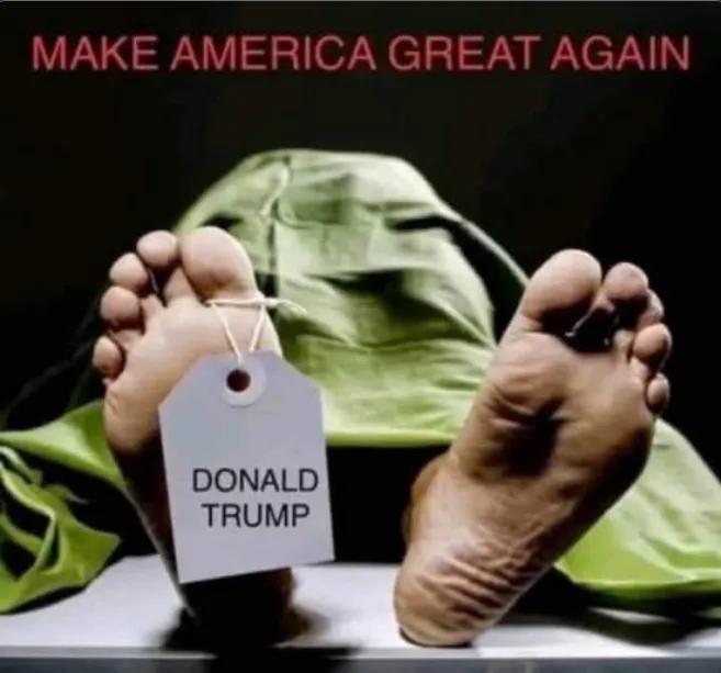 A close-up image shows the bare feet of a deceased person lying in a green body bag, with a white identification tag hanging…
