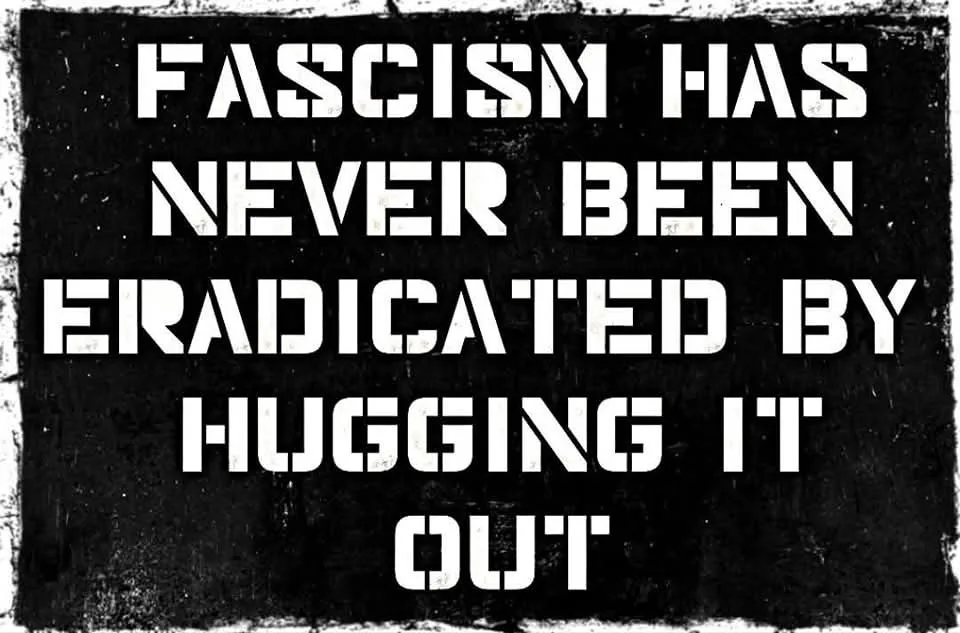 A black-and-white image with a distressed, textured background displays bold, white, stencil-style text that reads 'FASCISM…