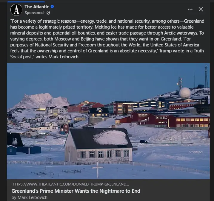 A screenshot of a The Atlantic article about Greenland's strategic importance, overlaid on a photo of a snowy town with red…