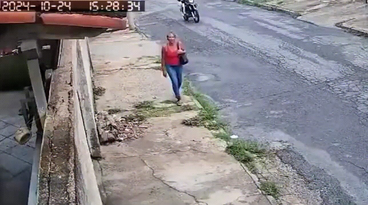 A six-panel security camera sequence shows a woman in a red top approaching a parked motorcycle. She interacts with the…