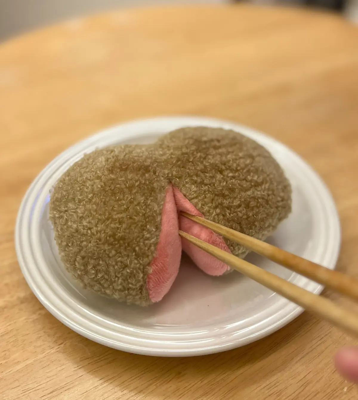 A Plush Toy Hamburger Steak That Looks Undercooked Inside