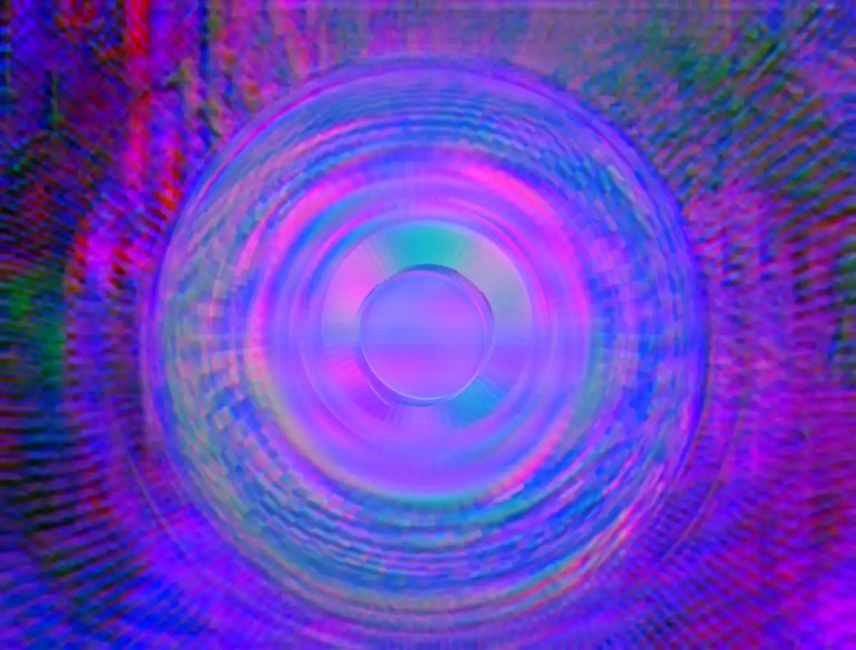 The image displays a psychedelic, glitch-art style visual with concentric circles radiating outward from a central point…