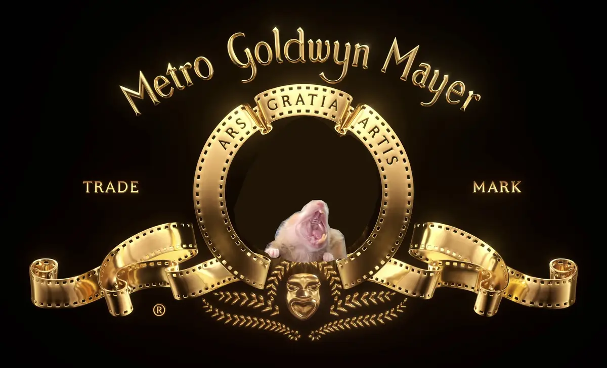 The iconic golden Metro Goldwyn Mayer logo, featuring the roaring lion, is replaced by a small rodent with its mouth wide…