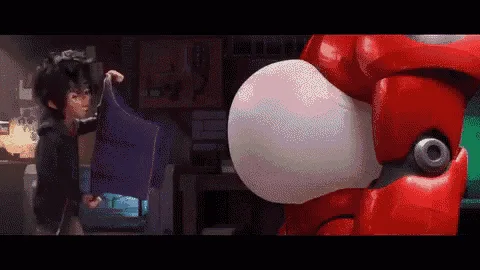 A sequence from the animated movie 'Big Hero 6' shows Hiro Hamada struggling to stuff a blue folder into the large, round…
