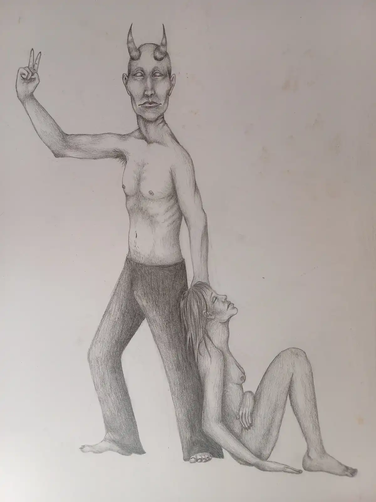 A pencil sketch shows a horned, demonic-looking man standing and making a peace sign with his right hand while holding a…