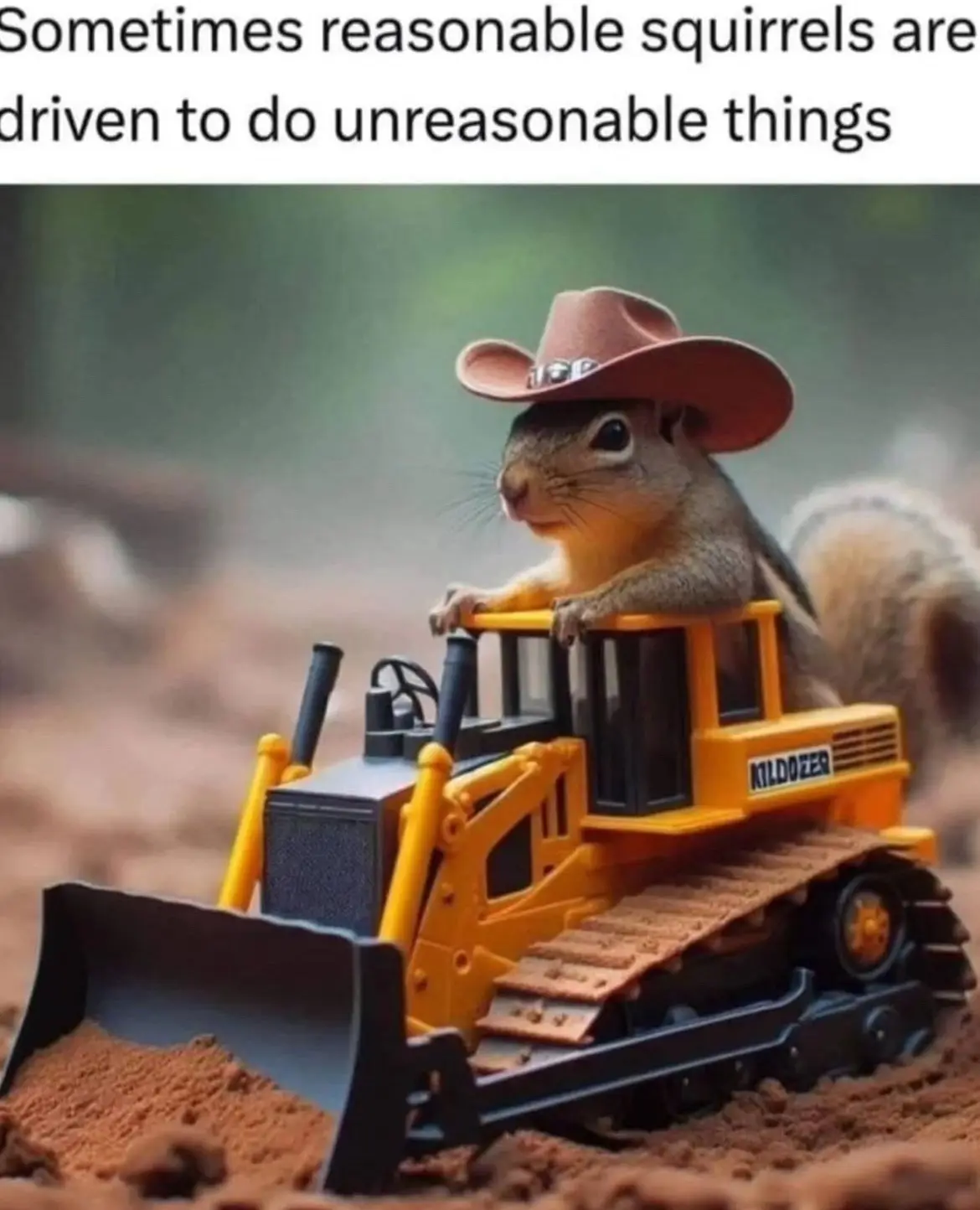 A small squirrel wearing a brown cowboy hat is sitting atop a yellow toy bulldozer labeled 'MILDOZER', which is pushing dirt…