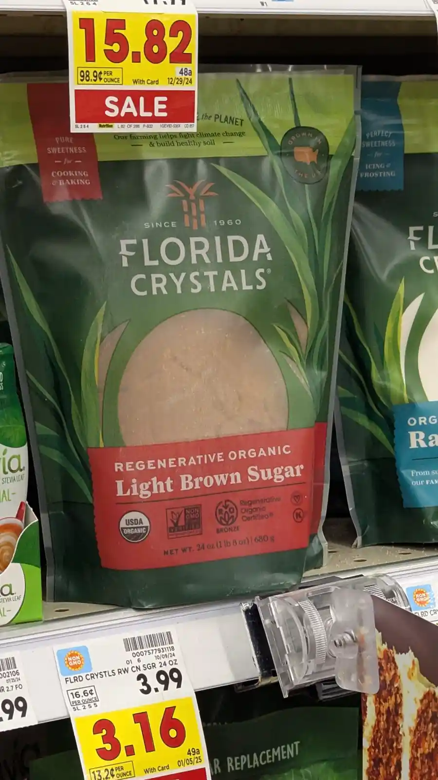 A bag of Florida Crystals regenerative organic light brown sugar is on sale for $15.82, with a price tag showing 98.9 cents…
