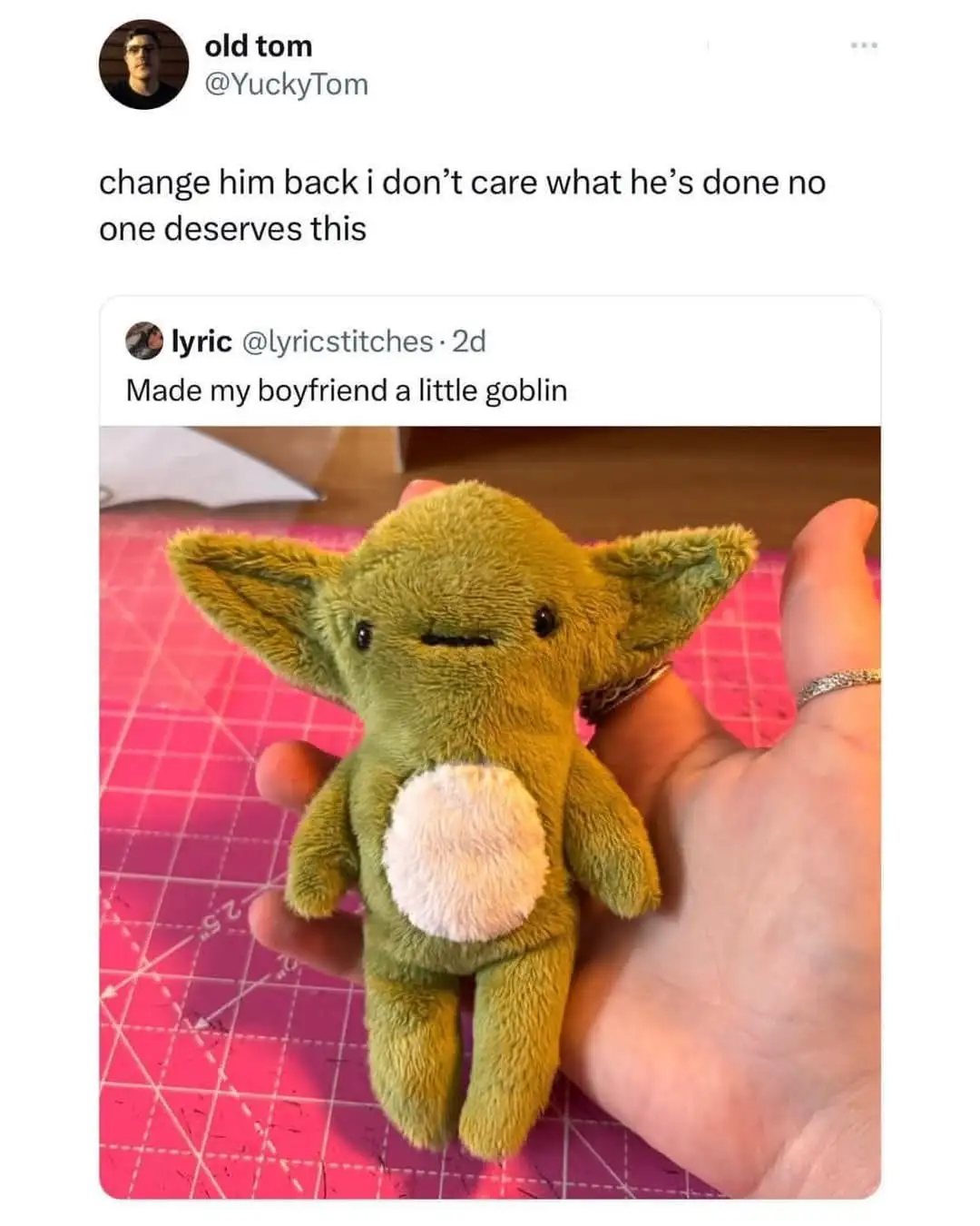 A screenshot of a tweet thread shows a user named 'lyric' posting a photo of a small, green, plush toy resembling a goblin…