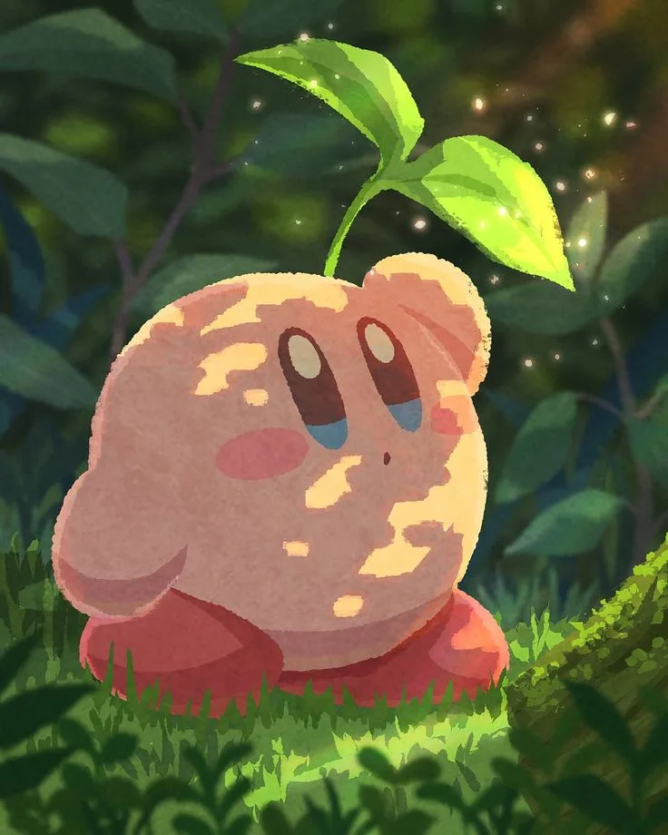 A pink, round, cartoon character with large eyes and a small mouth sits in grass, with a small green plant sprouting from…