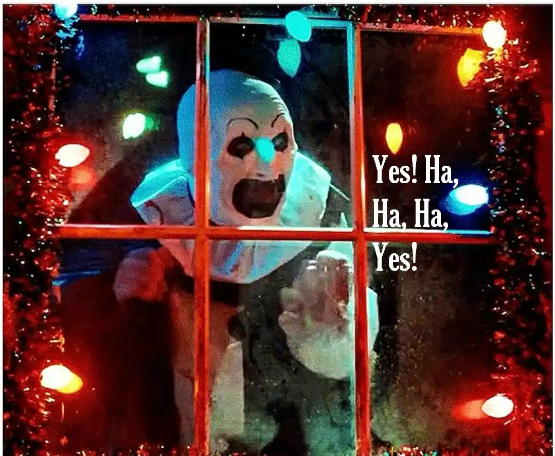 A scary clown with a wide, menacing grin peers through a paneled window decorated with red tinsel and colorful Christmas…