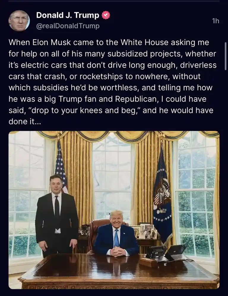 A screenshot of a tweet from Donald J. Trump's verified account showing a photo of him seated at a large wooden desk in the…