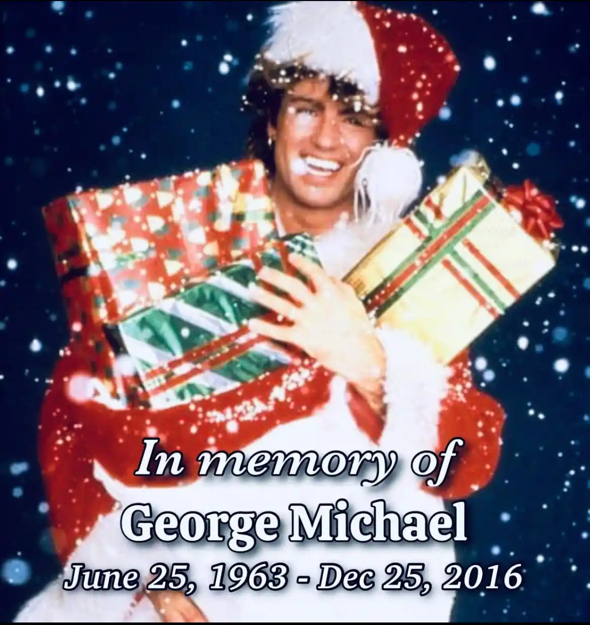 A man in a Santa suit holding wrapped Christmas presents against a snowy background, with text overlay reading 'In memory of…