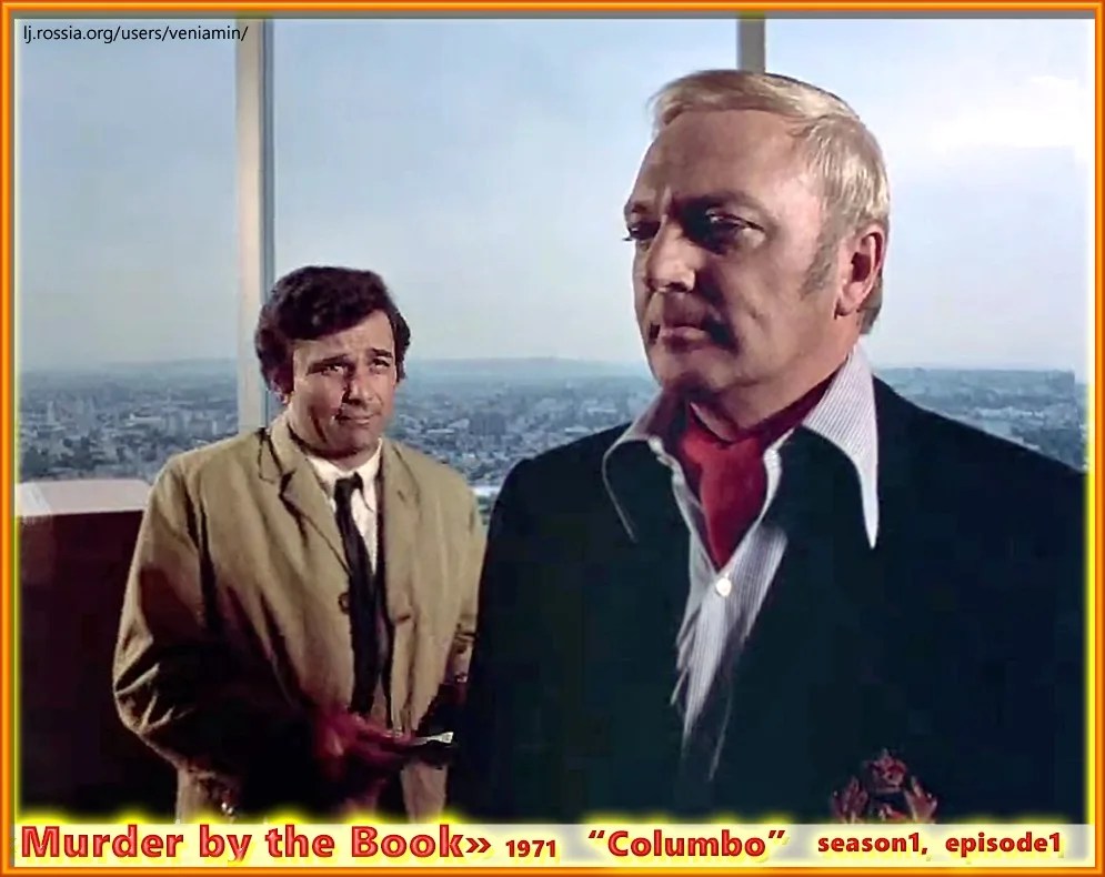 Two men stand in a high-rise room overlooking a cityscape. The man on the right, wearing a dark suit and red shirt, has a…