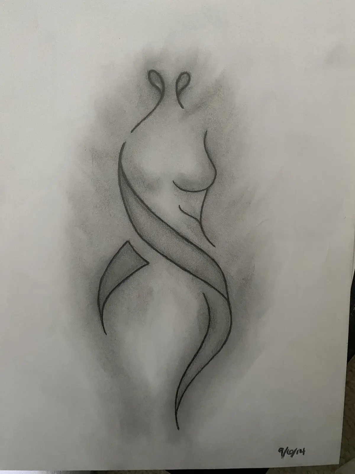 A pencil sketch on paper depicts a stylized, abstract human-like figure with a smooth, flowing outline and minimal shading…