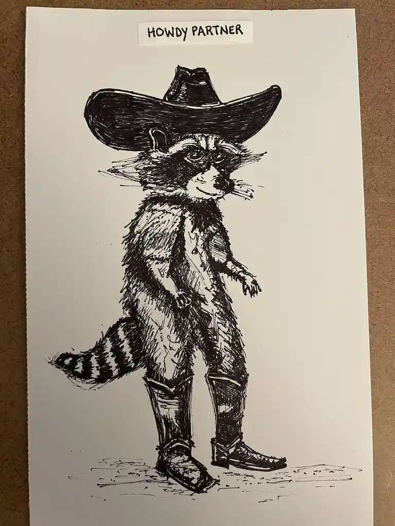 A black-and-white ink drawing of a raccoon dressed in cowboy attire, including a wide-brimmed hat, boots, and jeans…