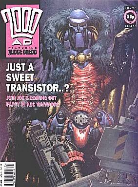 A comic book cover featuring a heavily armored, robotic-looking character with a large, feathered cape and exposed red…