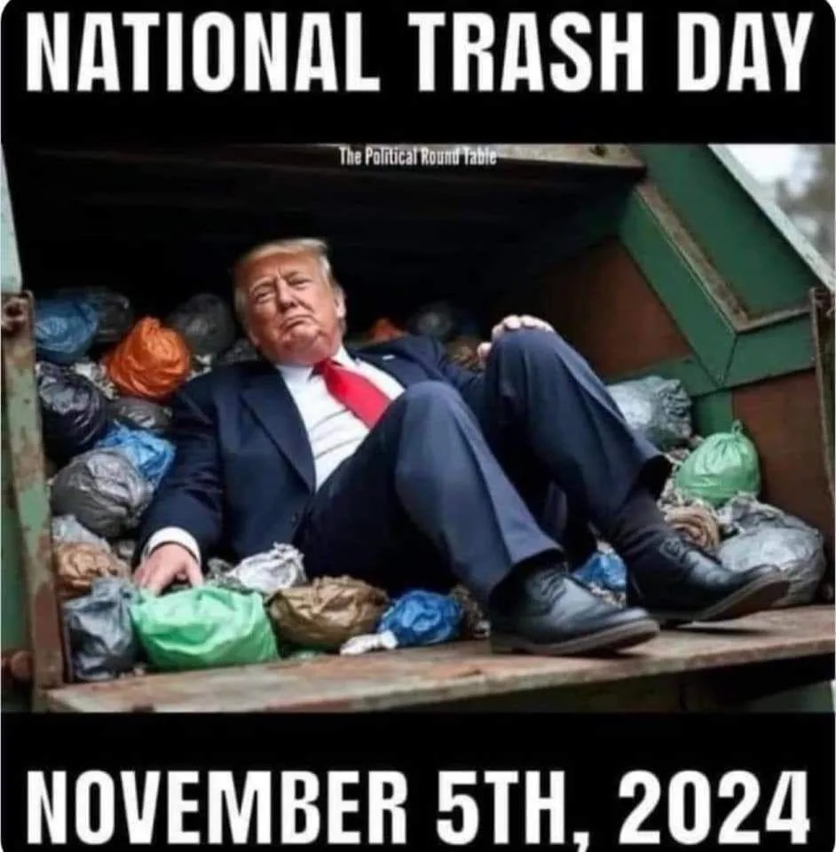 A man in a dark suit and red tie is lounging inside a green dumpster filled with trash bags, looking relaxed. The text at…