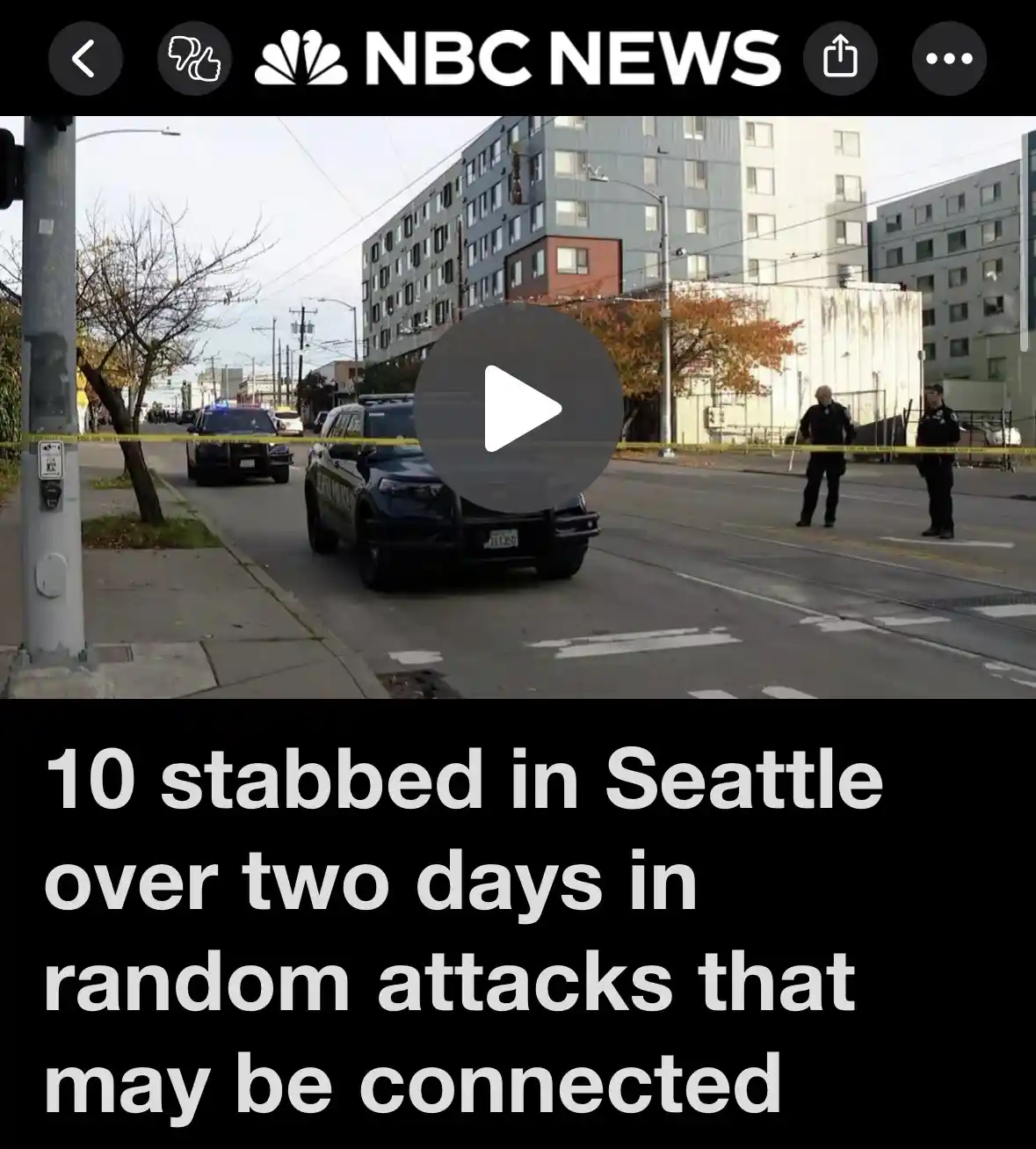 A screenshot of an NBC News video thumbnail shows police cars and officers at a crime scene cordoned off with yellow tape on…