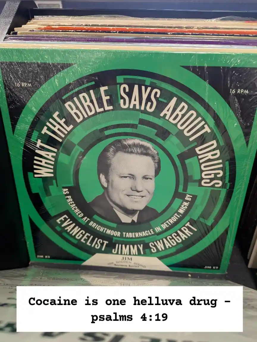 A close-up photo of a vintage green vinyl record sleeve for 'What the Bible Says About Drugs' by evangelist Jimmy Swaggart…