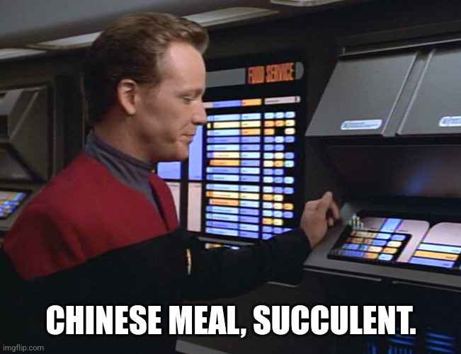 A man in a red and black Starfleet uniform stands at a futuristic food service terminal, selecting an option. The screen…
