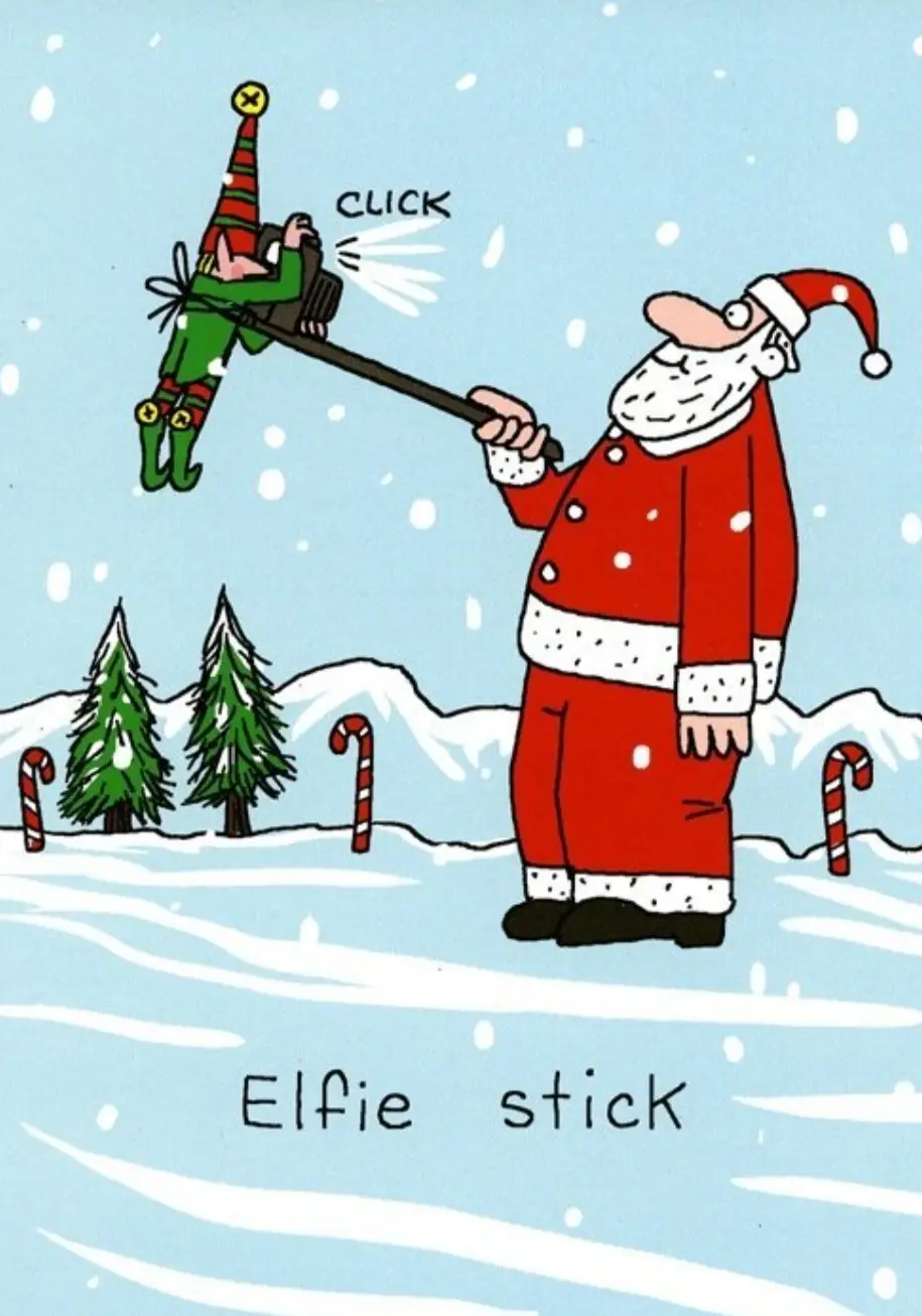 Santa Claus stands in a snowy landscape with candy canes and pine trees, holding a selfie stick extended toward a small…