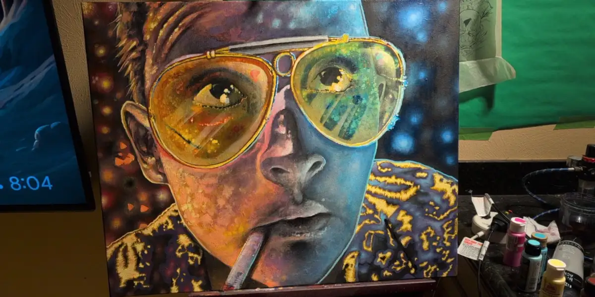 A colorful painting of a person with blue skin, wearing large gold-rimmed sunglasses and a patterned shirt, with paint…
