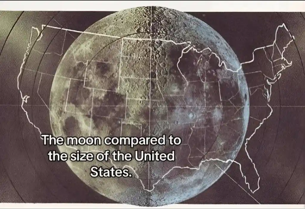 The image displays a large, detailed image of the moon overlaid with a white outline of the United States map, visually…