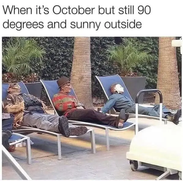 Three people dressed as horror movie characters—Freddy Krueger, Jason Voorhees, and Michael Myers—are lounging on blue…