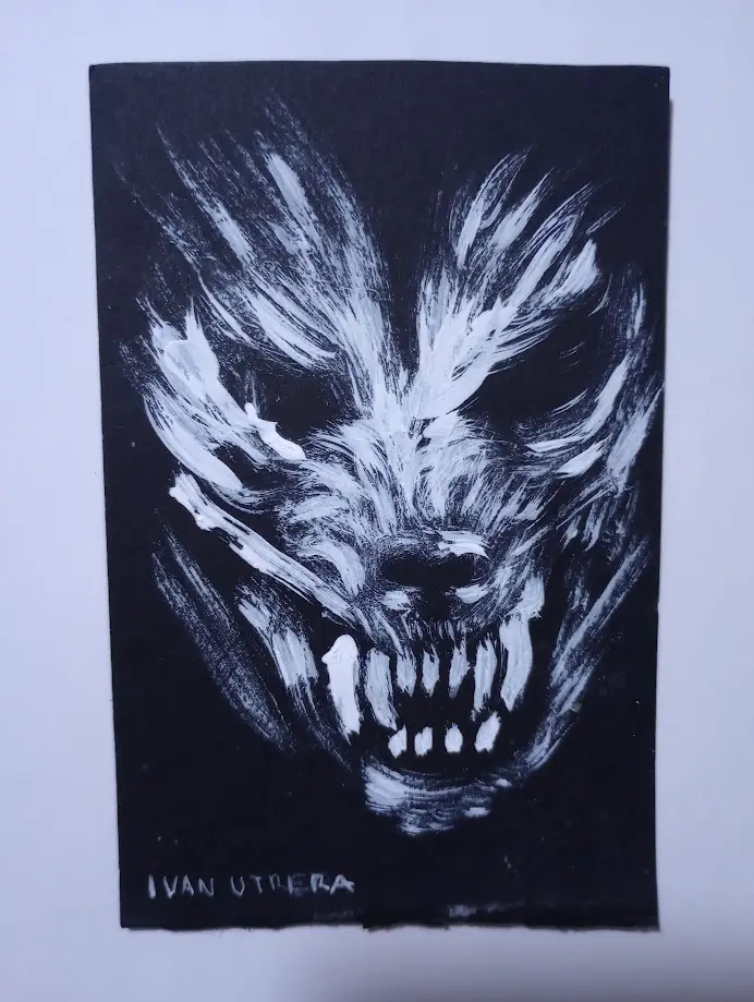 A black-and-white painting on dark paper depicts a stylized, menacing wolf-like creature with sharp teeth, wild fur, and an…