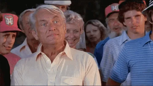 A four-panel image sequence from the movie 'Caddyshack' shows actor Robert Culp's character, a golf course official…