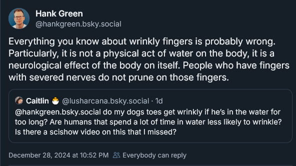 A screenshot of a social media post by Hank Green explaining that wrinkly fingers are a neurological effect, not caused by…