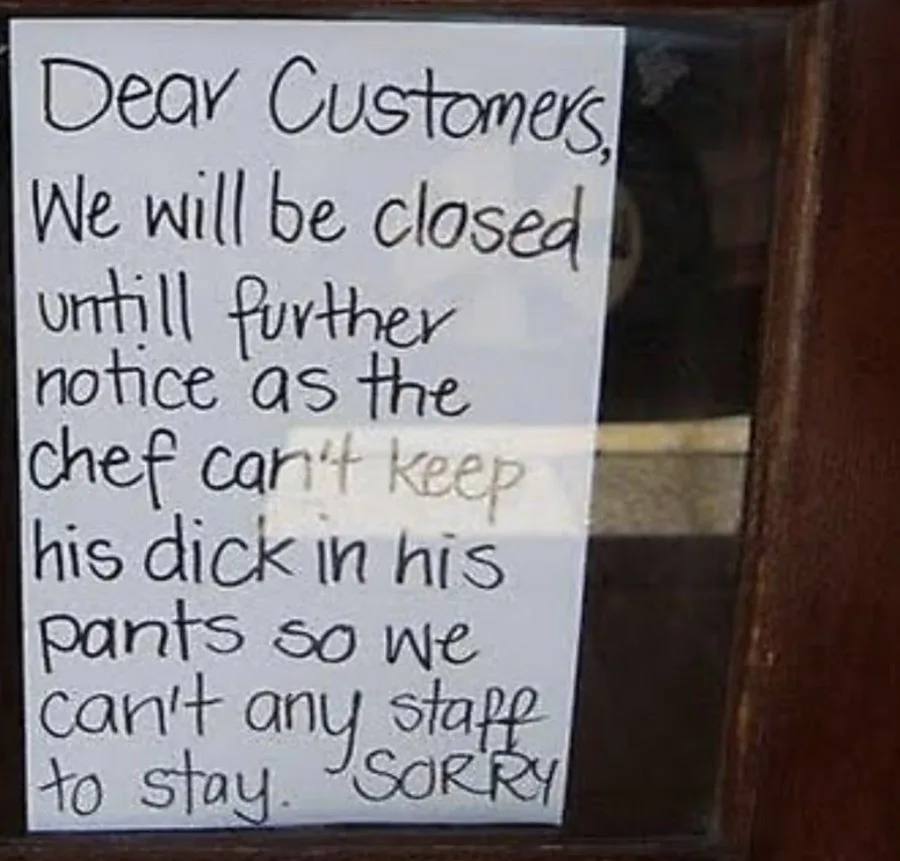 A handwritten sign taped to a glass door announces a business closure due to the chef being unable to keep his 'dick in his…