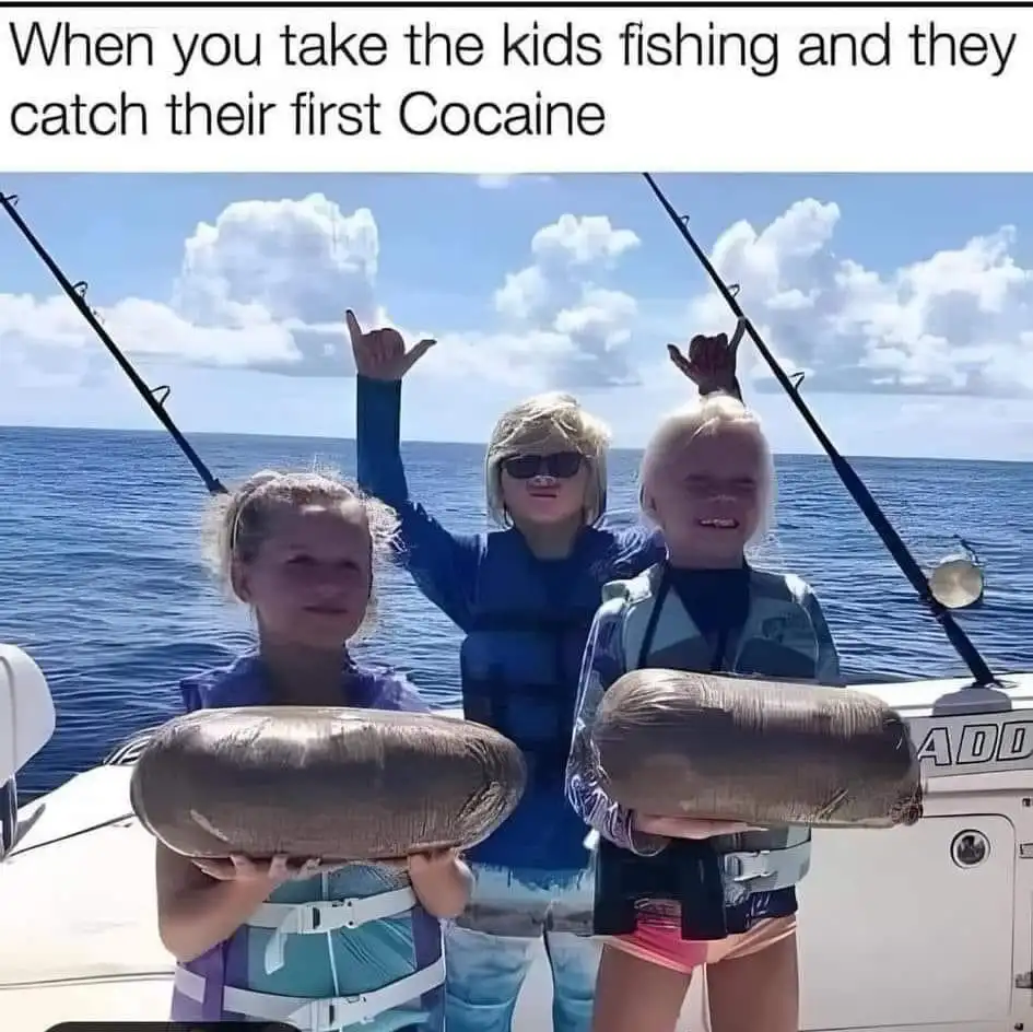 Three children on a boat holding large, wrapped, brownish objects that resemble fish, with fishing rods visible. The…