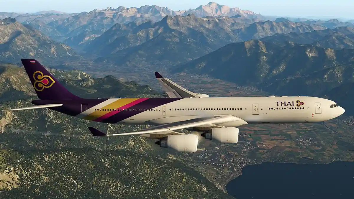 A Thai Airways Airbus A330 is shown flying over a mountainous landscape with a lake below. The aircraft's livery features…