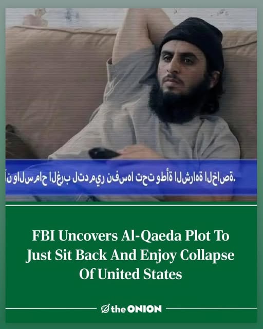 A man with a beard and black head covering lounges on a couch, holding a remote, looking relaxed. A blue banner with Arabic…