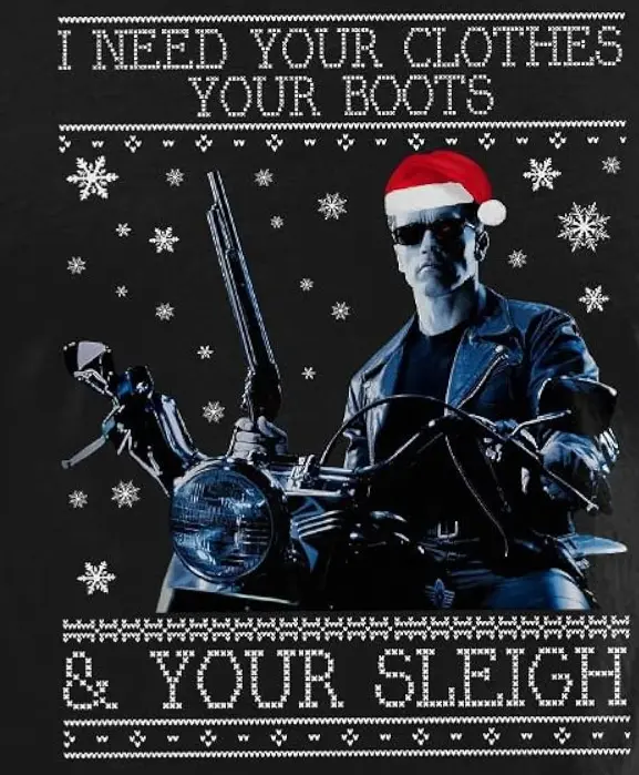 A black Christmas sweater design features a stern-looking man in a leather jacket and sunglasses, wearing a red Santa hat…