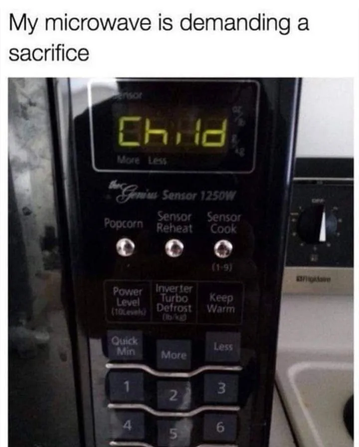 A close-up photo of a black microwave oven's control panel, where the digital display clearly shows the word 'Child' in…