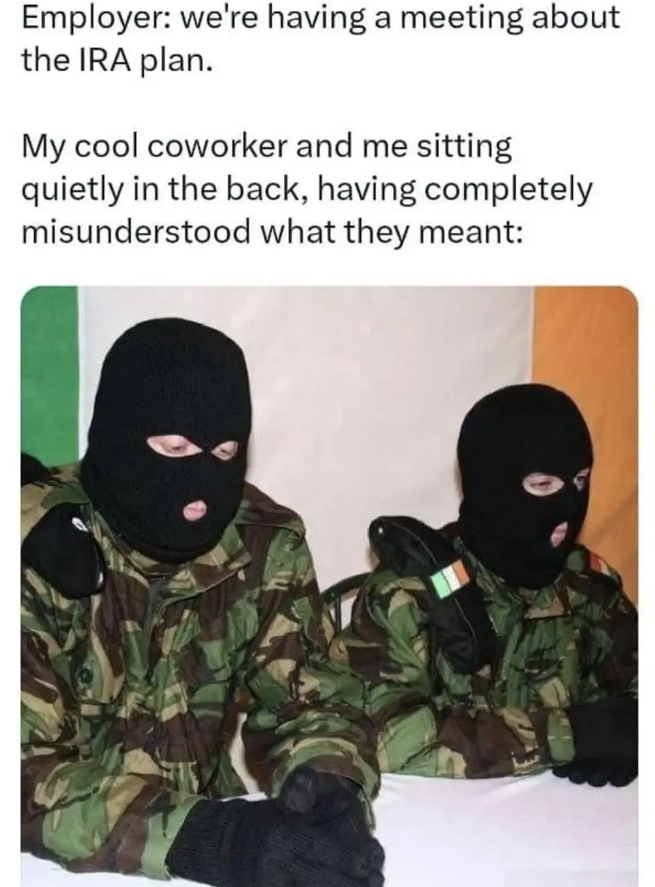 Two people wearing black ski masks and camouflage jackets sit at a table, appearing to be in a meeting. The text above them…