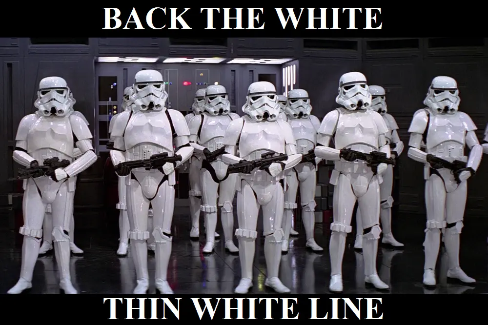 A group of stormtroopers in white armor stand in formation holding blasters, with the text 'BACK THE WHITE' at the top and…