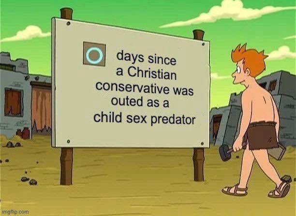 A cartoon caveman walks past a large sign in a desert-like setting with ruins in the background. The sign has a circular…