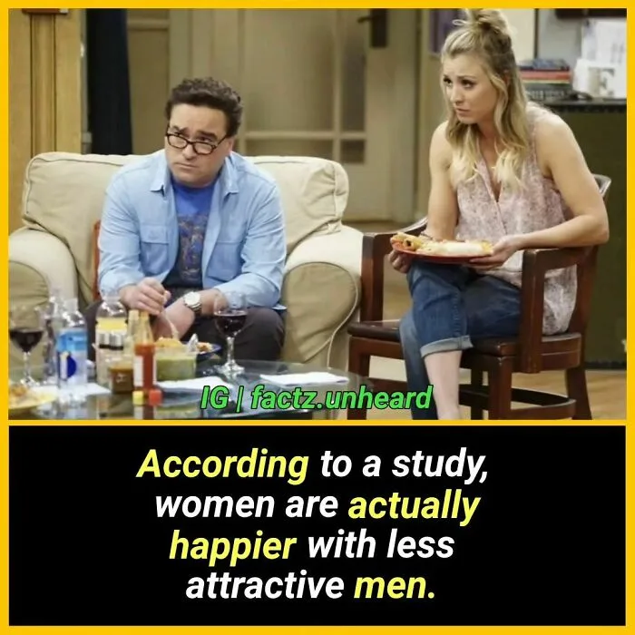 A man and woman sit in a living room, the man looking downcast while the woman looks at him with a concerned expression. The…