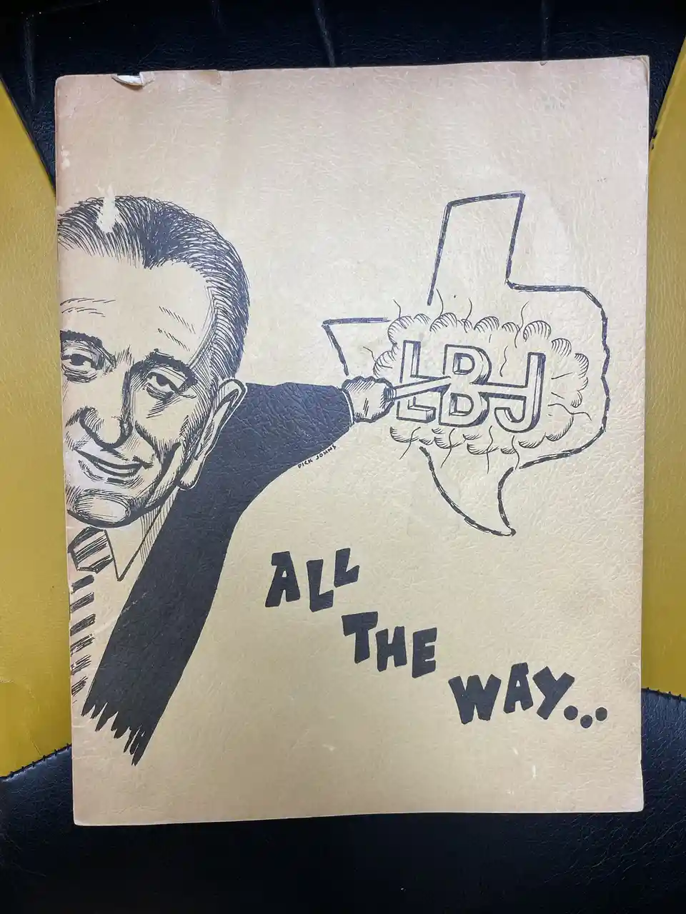 A vintage political cartoon depicts a smiling man in a suit extending his arm to hold a smoking gun shaped like the state of…