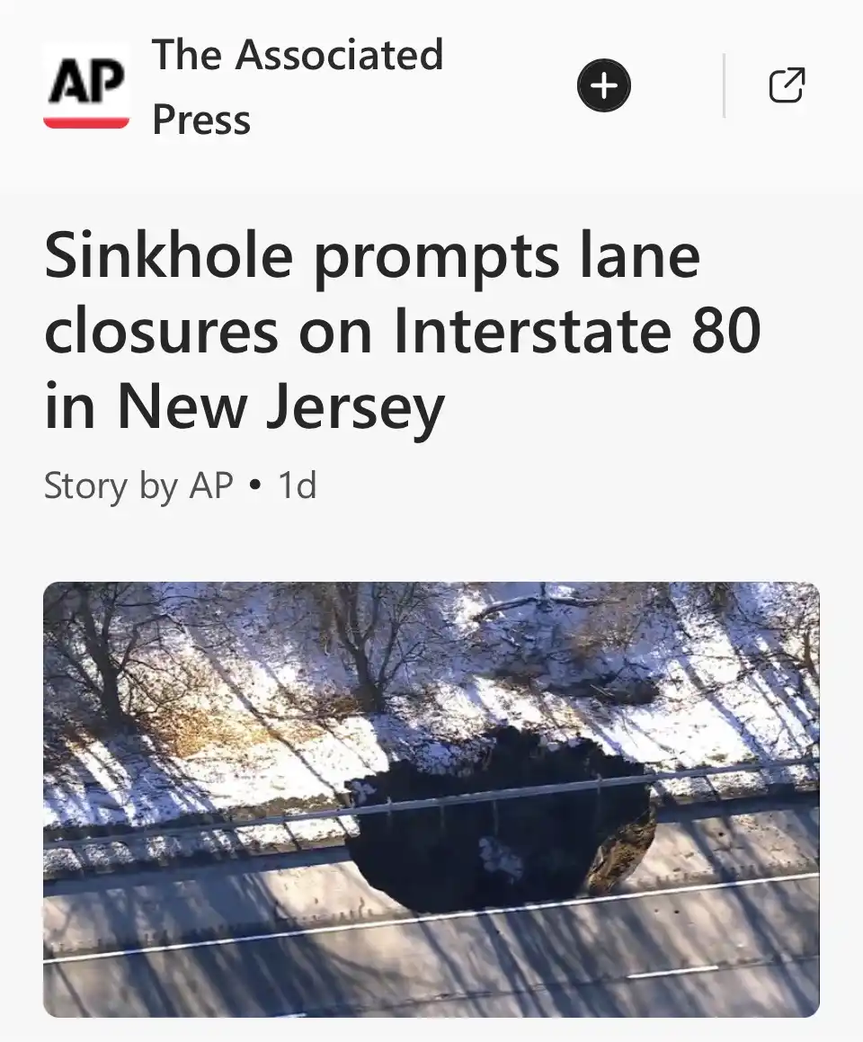 An Associated Press news article screenshot shows a large sinkhole opening in a snowy roadside embankment next to a highway…