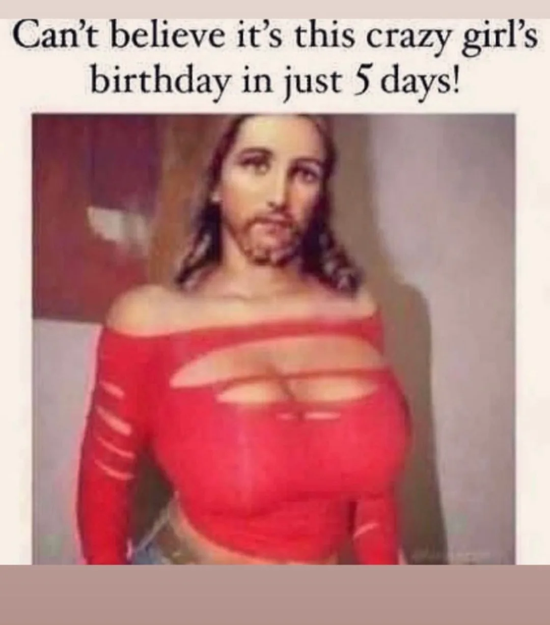 A person with long dark hair and a beard, wearing a red off-the-shoulder top with cutouts, is shown in a photo. The text…