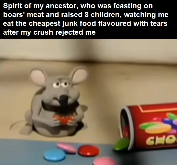 A claymation mouse sits on a surface, holding a small red object, with a spilled red candy tin nearby. The overlaid text…