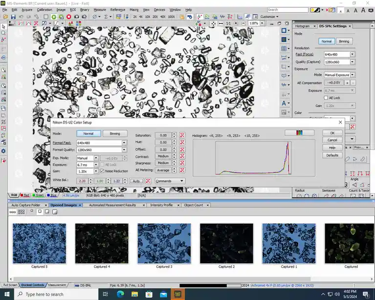 A screenshot of a microscope image analysis software interface showing a microscopic view of numerous small, irregularly…