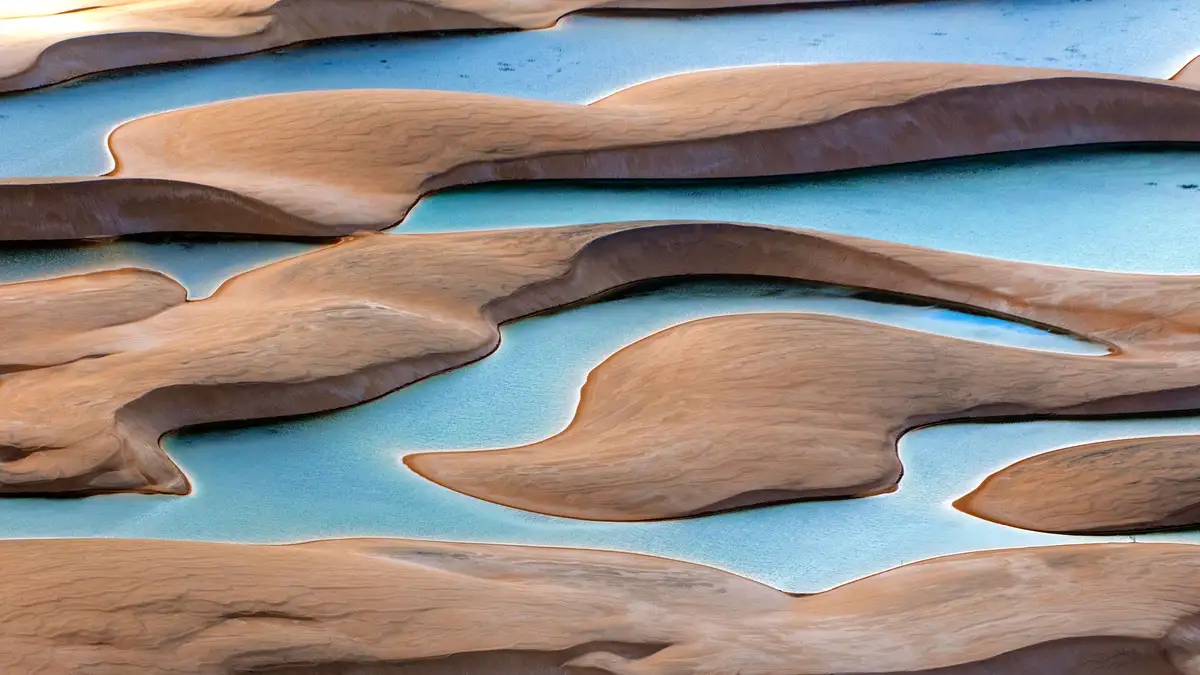 In Brazil's LenÃÂ§ÃÂ³is Maranhenses National Park, a unique landscape unfolds. Rainwater fills the nooks, crannies, and…